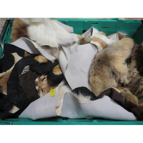 77 - A tray of animal hides