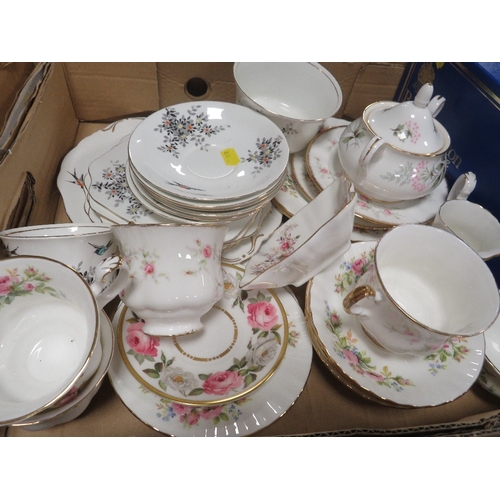 82 - Four trays of assorted ceramics to include Royal Crown Derby, Royal Albert, Royal Doulton etc