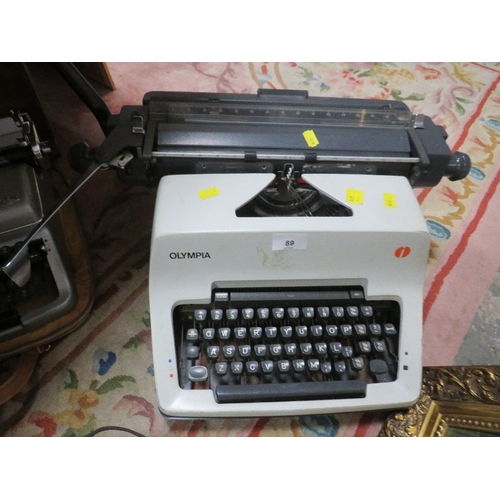 89 - A selection of vintage typewriters, reel to reel player etc