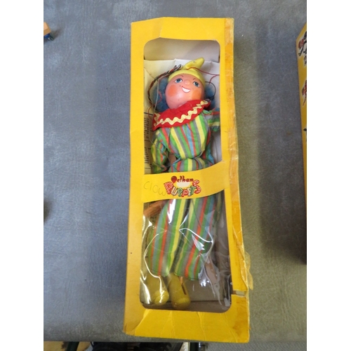 418 - THREE PELHAM PUPPETS, rare boxed 'Perky The Pig', boxed clown and boxed black poodle, with FOUR UNBO... 