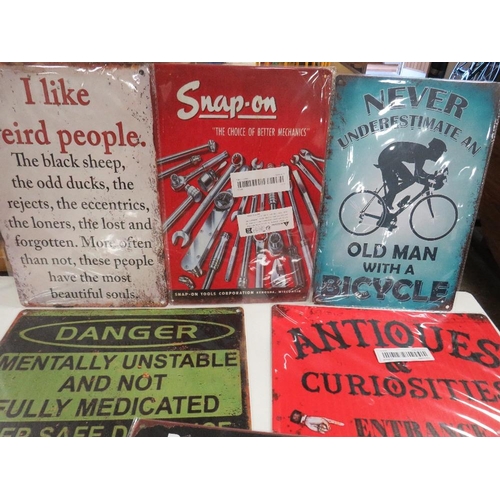 128 - A selection of assorted vintage style metal signs to include Snap- On Tools, Pacman etc.,