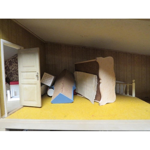 223 - A vintage dolls house with contents A/F together with a vintage Triang baby walker brick set A/F