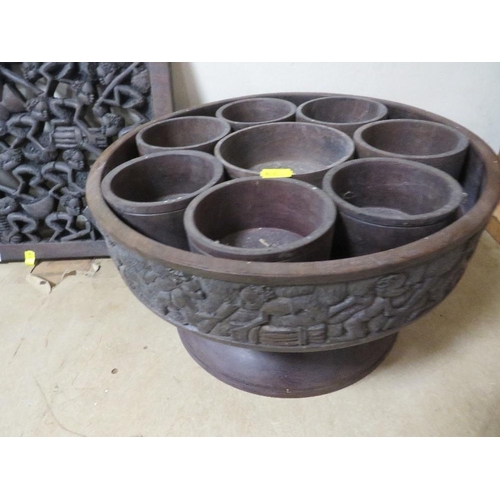 242 - A carved wooden African style panel, fruit bowl etc (4)