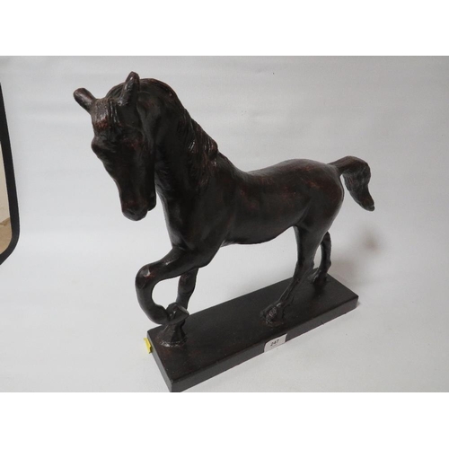 247 - A modern bronze effect model of a horse