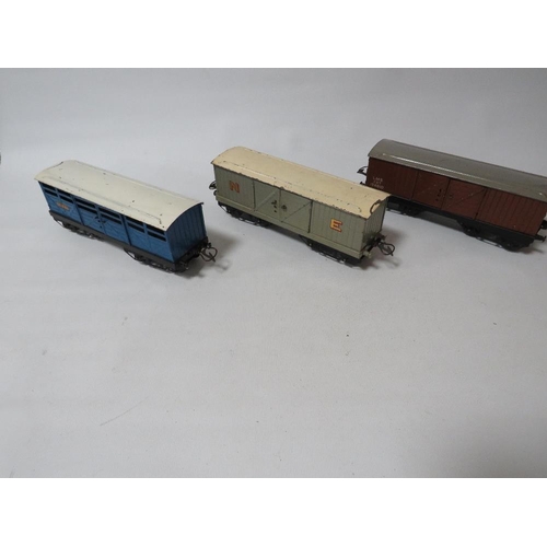 251 - Three unboxed Hornby 0 gauge covered wagons