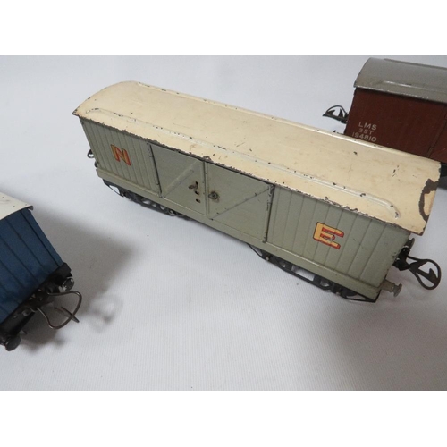 251 - Three unboxed Hornby 0 gauge covered wagons