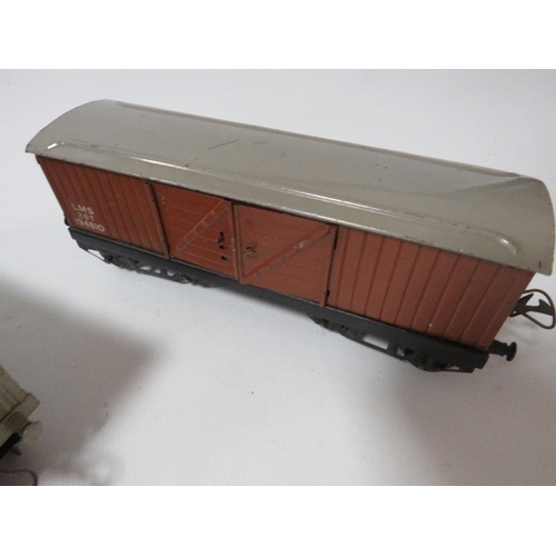 251 - Three unboxed Hornby 0 gauge covered wagons