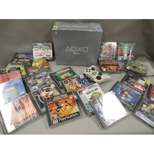 257 - A boxed PlayStation PS One with hand controller with 22 games (unchecked)