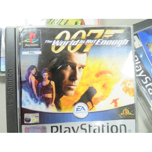 257 - A boxed PlayStation PS One with hand controller with 22 games (unchecked)