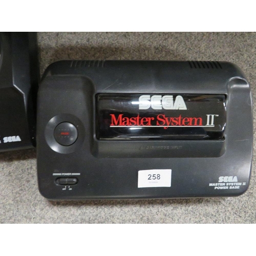 258 - A selection of vintage gaming equipment, accessories, games to include a Sega master system II, Supe... 