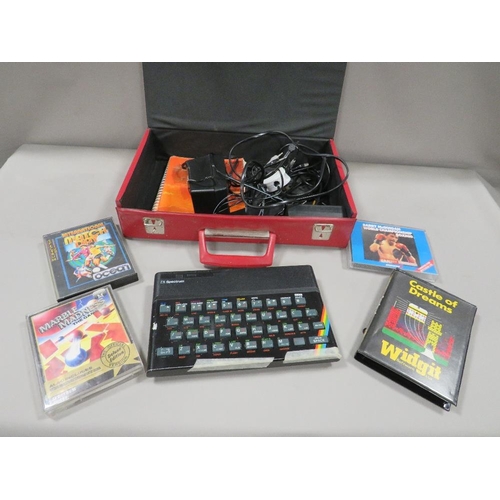 264 - A vintage Sinclair ZX Spectrum 48K together with a many games (unchecked)