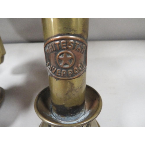 266 - A pair of brass wall mounted adjustable paraffin lamp holders stamped White Star Liverpool