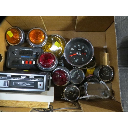 639 - A tray of vintage car parts lights/gauges and a cassette player