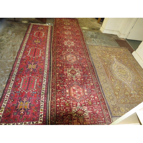 813 - Three rugs to include two runners - 390 cm x 93 cm, 298 cm, x 66 cm and a silk rug 125 x 200 cm (3)