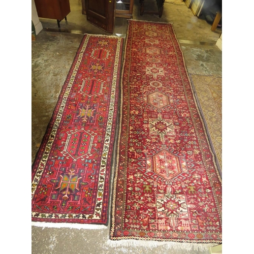 813 - Three rugs to include two runners - 390 cm x 93 cm, 298 cm, x 66 cm and a silk rug 125 x 200 cm (3)