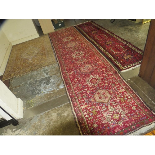 813 - Three rugs to include two runners - 390 cm x 93 cm, 298 cm, x 66 cm and a silk rug 125 x 200 cm (3)