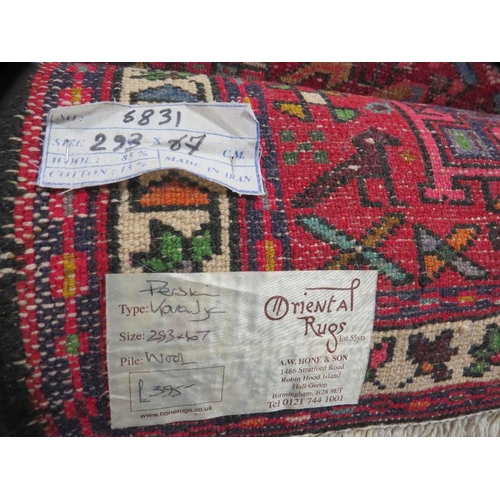 813 - Three rugs to include two runners - 390 cm x 93 cm, 298 cm, x 66 cm and a silk rug 125 x 200 cm (3)