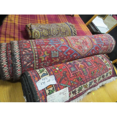 813 - Three rugs to include two runners - 390 cm x 93 cm, 298 cm, x 66 cm and a silk rug 125 x 200 cm (3)