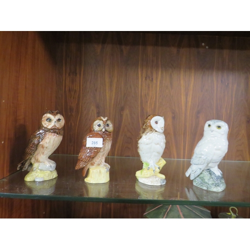 285 - Four Royal Doulton owls