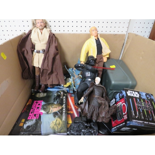 277 - A tray of unboxed Star Wars figures to include Darth Mack and Dark Vader, books, mug, money box etc