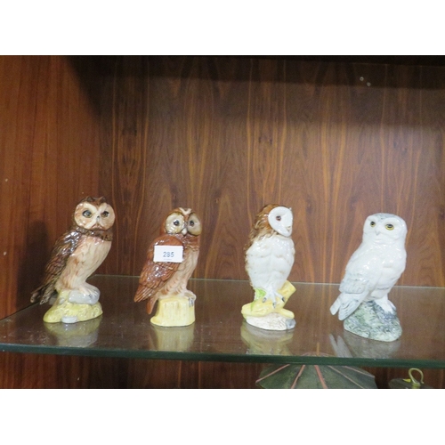 285 - Four Royal Doulton owls