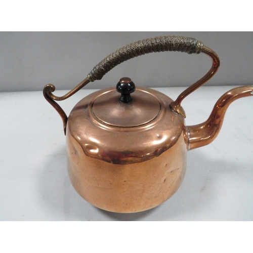 317 - An Arts & Crafts copper kettle impressed to base T & Co