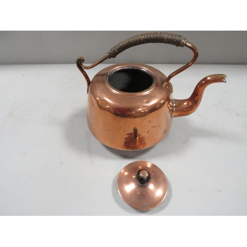 317 - An Arts & Crafts copper kettle impressed to base T & Co