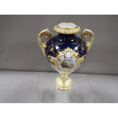 323 - A twin handled Coalport urn