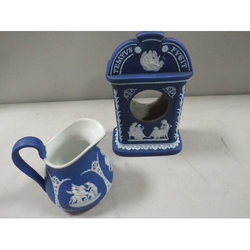 329 - A Wedgwood blue dip mantle clock mount together with a similar small jug (2)