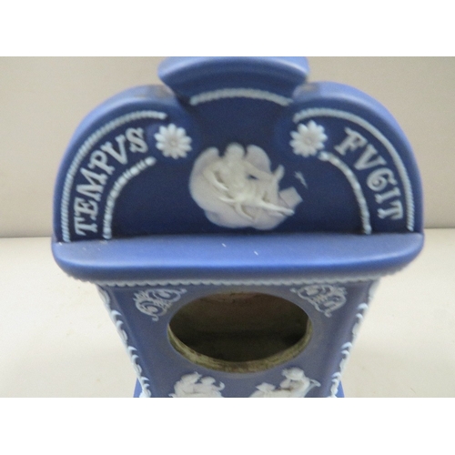 329 - A Wedgwood blue dip mantle clock mount together with a similar small jug (2)