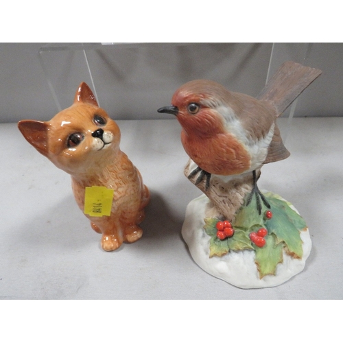 336 - A Royal Doulton seated Ginger cat together with three assorted bird figures one A/F