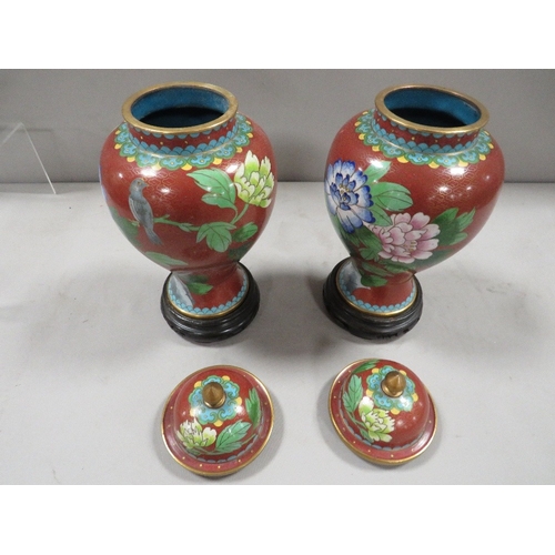 337 - A pair of modern Oriental Cloisonne vases with stands