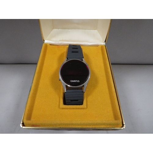 361 - A Quartus 1500 wrist watch in original box together a tray of assorted wrist watches A/F