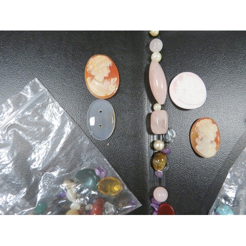 362 - A quantity of gemstones and cameos