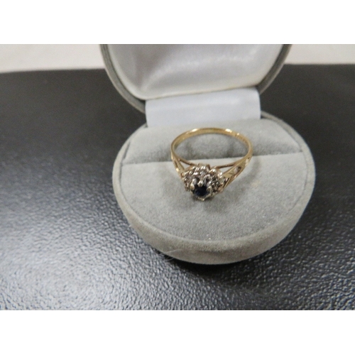 363 - A hallmarked 9 carat gold sapphire and diamond ring approx. weight 2.2g