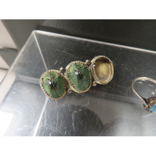 374 - Two vintage silver rings and antique Scarab brooch