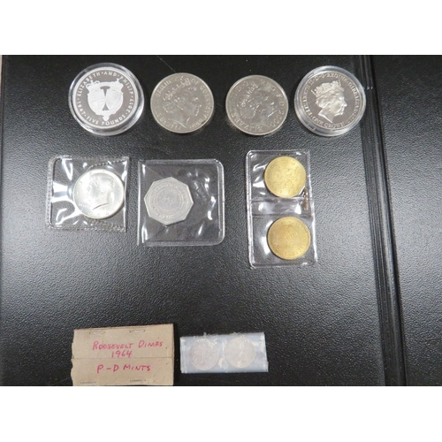 393 - A small collection of mainly commemorative coins, to include Alderney 2017 silver five pounds, a US ... 