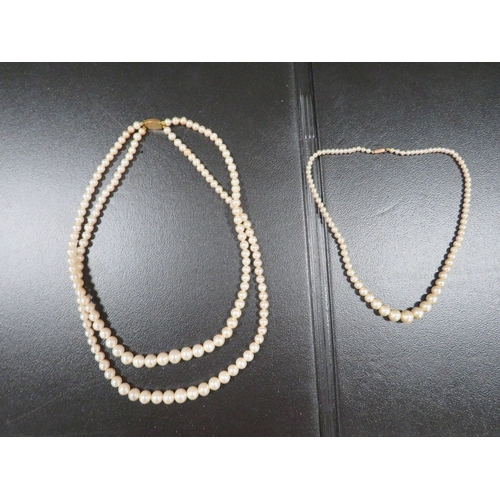 399 - Two strands of Ciro pearls / necklaces with 9ct gold clasps