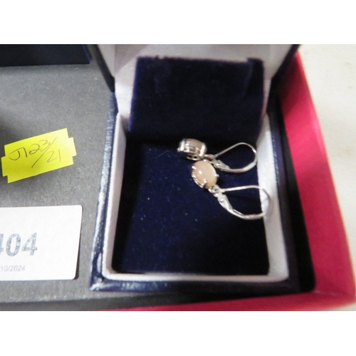 404 - Five boxed pairs of silver earrings etc, together with a loose pair of earrings and a ring