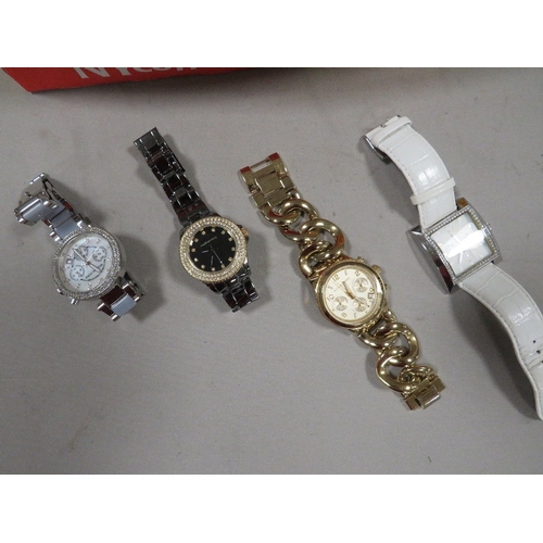 405 - A collection of assorted fashion / designer watches to include two Michael Kors, Red Herring etc.