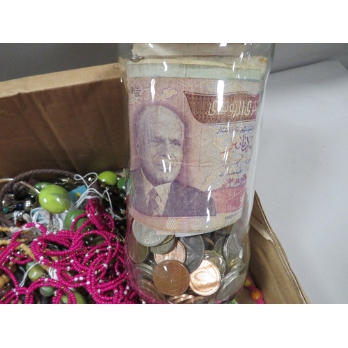 409 - A jar of coins and banknotes and a quantity of jewellery