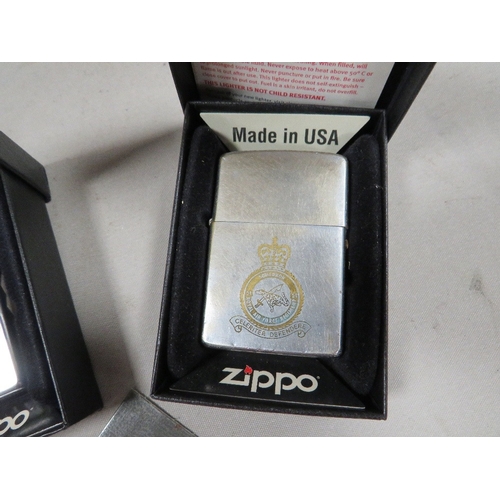 410 - Three boxed zippo RAF squadron lighters 51st, 26th squadrons and Goose bay (3) and a new wick in pac... 