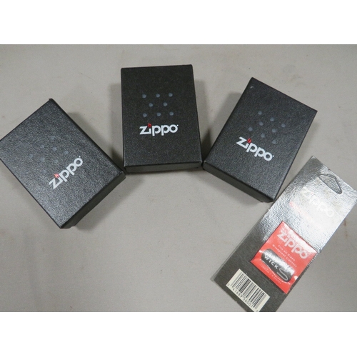 410 - Three boxed zippo RAF squadron lighters 51st, 26th squadrons and Goose bay (3) and a new wick in pac... 