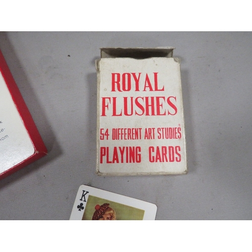 414 - Two boxed sets of glamour playing cards, 'Royal Flushes' and 'Cherchez la femme'