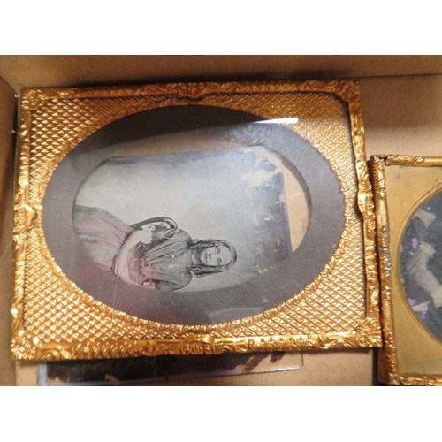 420 - A selection of vintage daguerreotypes, frames etc, to include an unusual ambrotype holder in the for... 