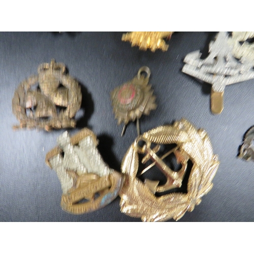 434 - A bag of military badges