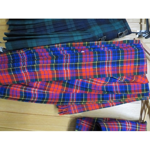 463 - Three kilts to include two McPherson kilts and a Blackwatch kilt - size 34