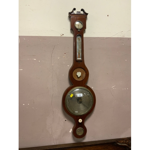 810 - A 19th century mahogany barometer minus mirror H 96 cm. A/F