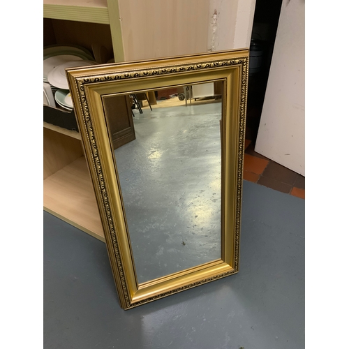 701 - Three modern gilt wall mirrors including an oval example. (3)