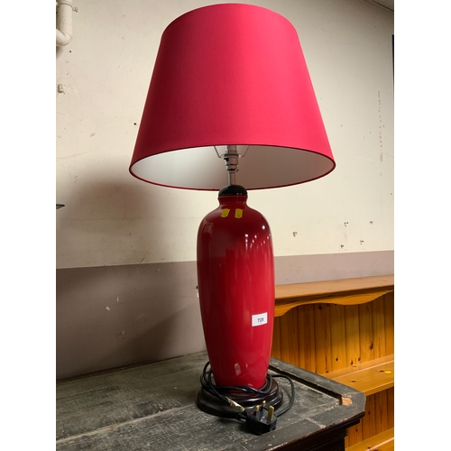 725 - A large modern red table lamp and shade H 75 cm (inc. shade)